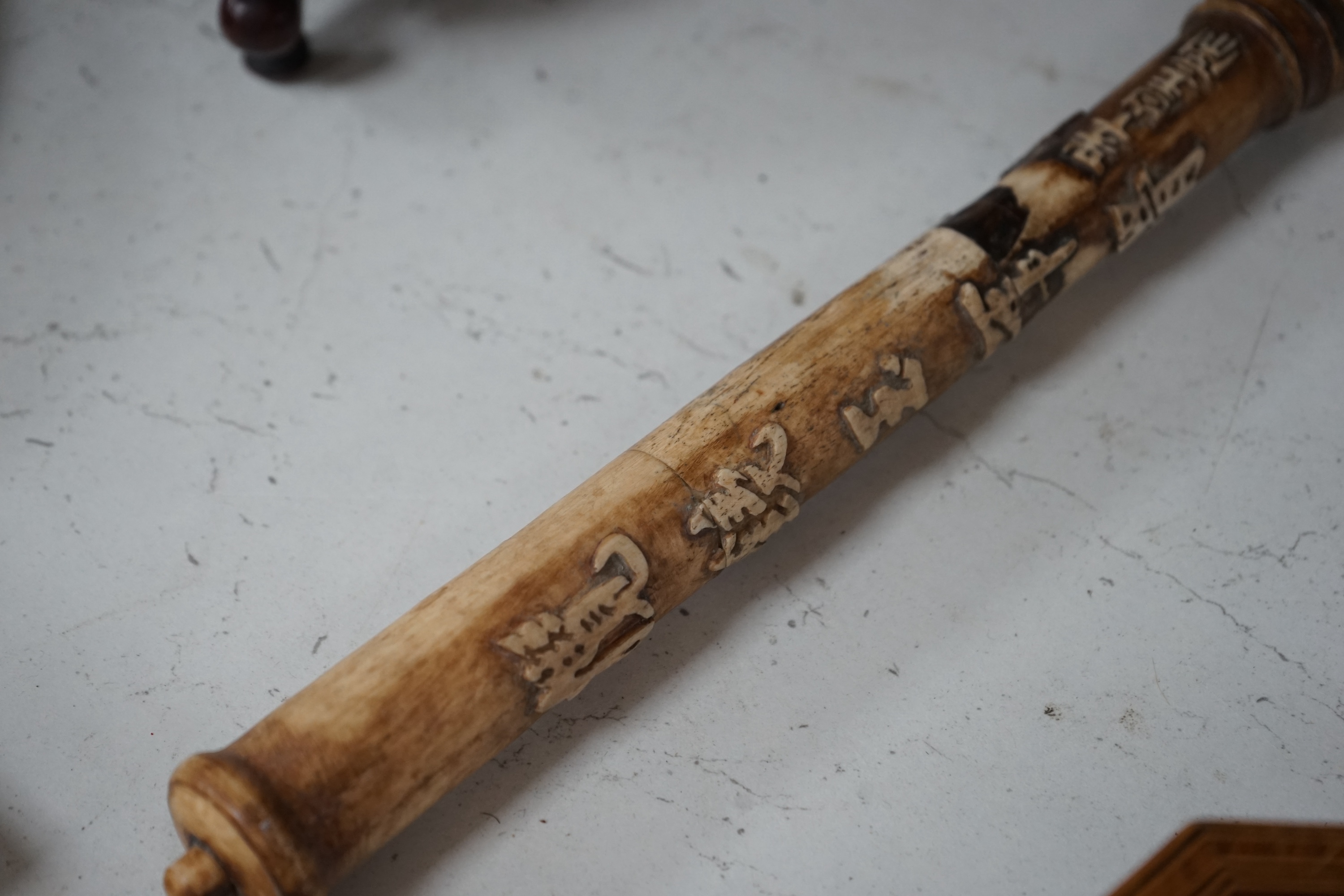 An 18th century Chinese export Imari pattern dish together with other Chinese blue and white ceramics, a hardwood stand and a bone calligraphy brush. Condition - varies